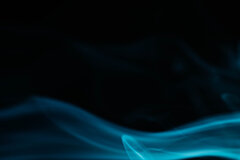 blue-wavy-smoke-black-background.jpg